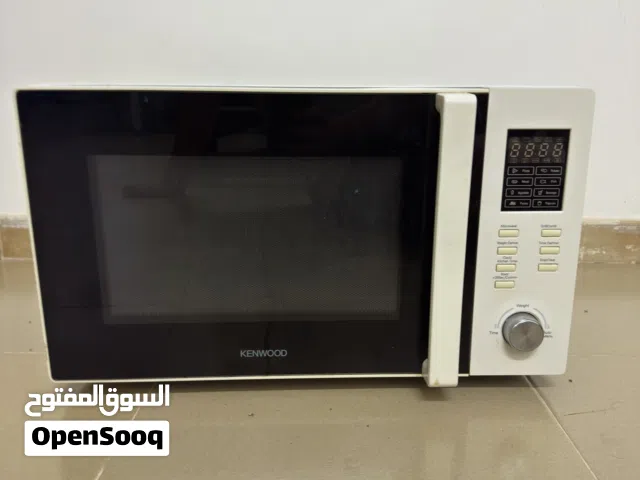 Kenwood MWL210 microwave oven, featuring a 900W microwave power output and a 1000W grill power.