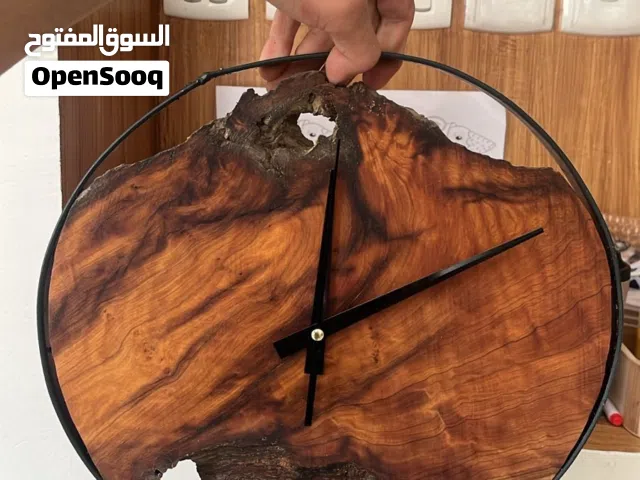 ساعه جداريه من الخشب الطبيعي