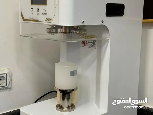ماكينة كبس علب العصير