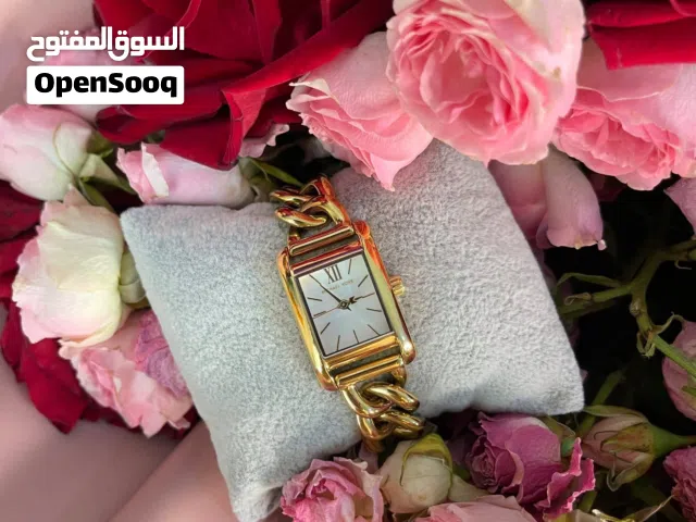 Michael Kors rectangular gold-tone bracelet watch with a chain-link style band and white dial