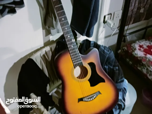 argent sell,, new guitar 7 days used, with bagpack, strings, belt,, picks,, tuner