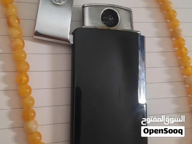 ولاعة ماركة  ....E.slim ..«
