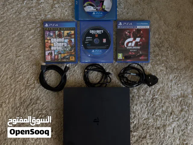PS4 Slim 1TB + 2 Controllers + 4 Games Excellent Condition  Clean & Working Perfectly