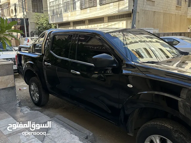 نيسان ناڤارا 2017 ترخيص 2018 دفع رباعي جير عادي ماشيه 96 الف كيلو فقط يد اولى