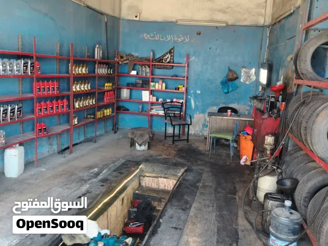محل غيار زيت وبناشر بابين مع ساحه للبيع