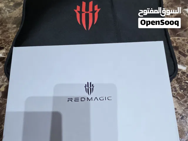 تابلت ردمجك استرا جهاز جديد استعمال ايام بالكرتونة والوصله ومعاه شنطه وكفر اصليات  256\12الداكرة
