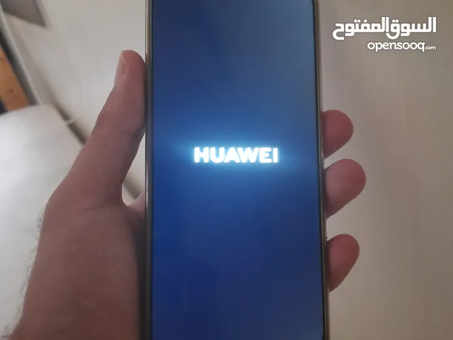 موبيل Huawei مع الشاحن بالعلبه تم فتحه ولم يستخدم