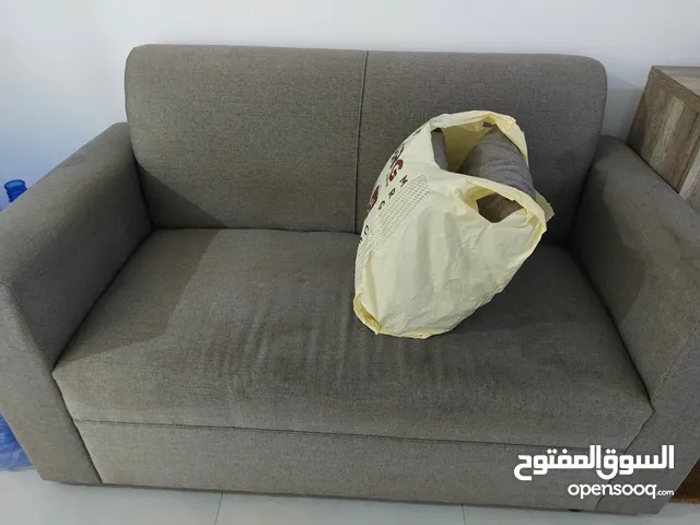 2 seater sofa with cushions10 KD
