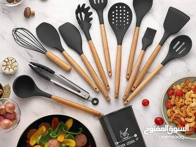 طقم كمش ومغارف سيليكون بيد خشب 12 قطعة من أهم الأدوات فى المطبخ طقم التوزيع خاصة لما يكون طقم