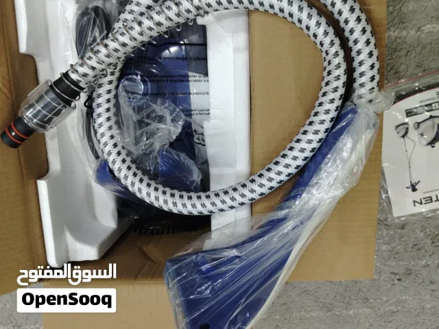 مكنسة ومكواة بخار