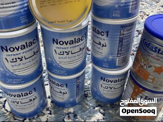 حليب تسع علب نوفيلاك وانفستار علبتين