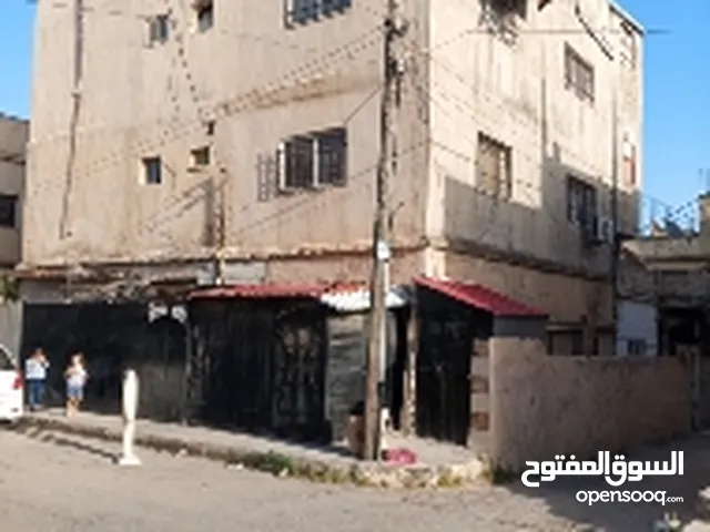 125 m2 More than 6 bedrooms Townhouse for Sale in Irbid Al Hisbeh Al Markizeya