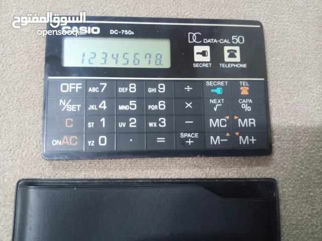 آلة حاسبة وجهاز Data Bank كلاسيكي ماركة CASIO DC-750A - قطعة نادرة قطعة أصلية