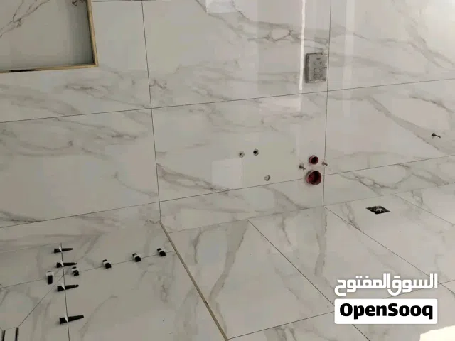 تركيب الكاشي والبورسلان والرخام والجرانيت بانواعه