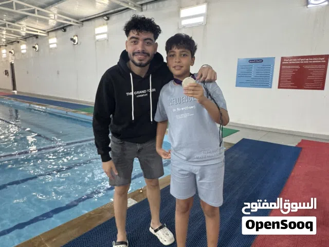 تعليم وتدريب السباحه