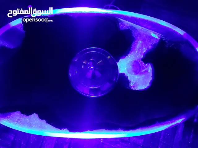 Luxury wooden and resin table for design living room.