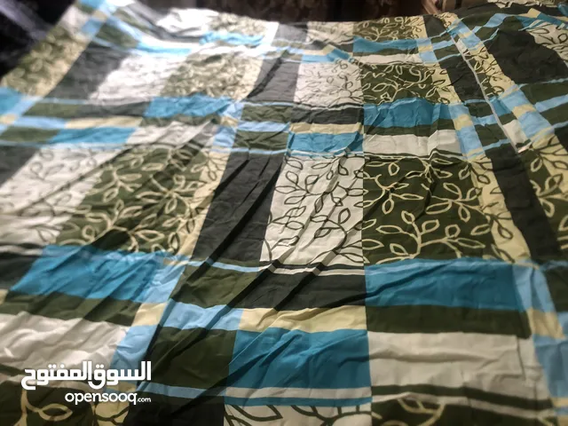 لحاف صوف   اصلي لسرير  مزوج  جديد  للبيع بداعي الحاجه