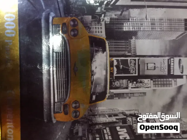 لعبة تركيب ( بزل ) على شكل سيارة تكسي داخل مدينة نيويورك الف قطعة