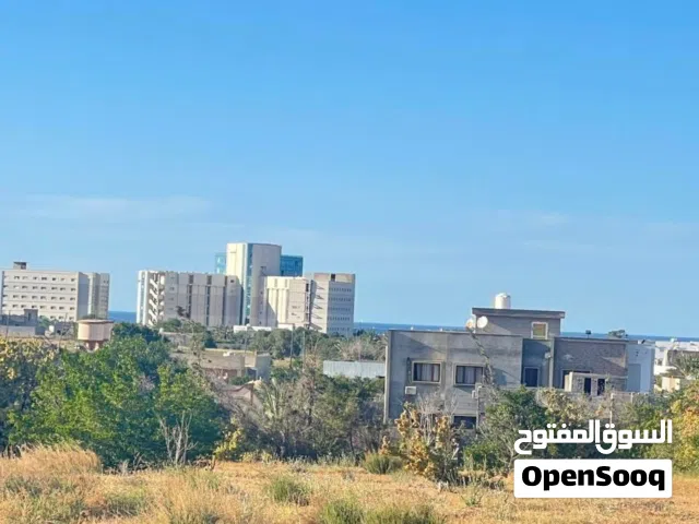ارض للبيع ف الجفينة-تاجوراء مسوره بالكامل وبيها غرفه غير مشطبه