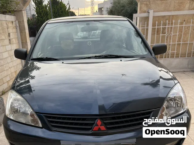 2011 ميتسوبيشي لانسر Standard