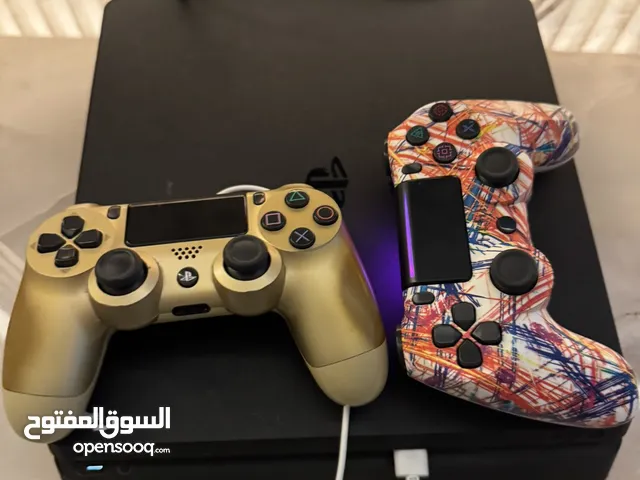 Playstation 4 slim 500mbs with controllers and preinstalled games