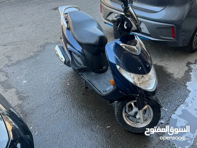 سكوتر سازوكي an