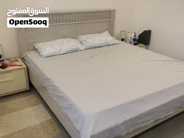 Double bed, wardrobe, bookshelves and table chair