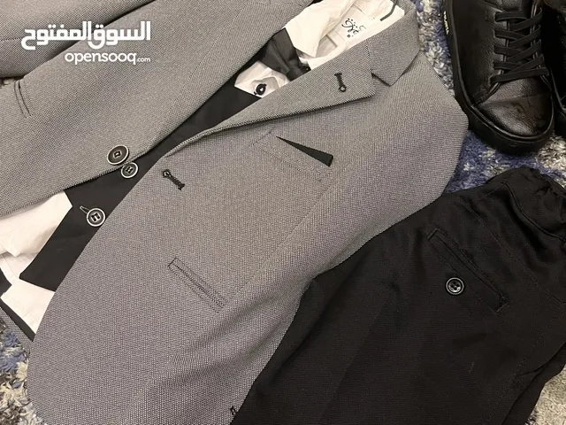 بدلة ولادي مع حذائها