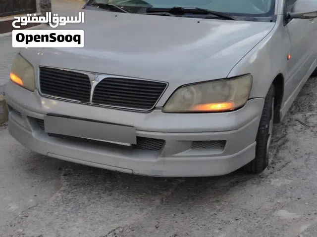 2002 ميتسوبيشي لانسر GLX