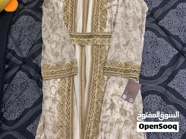 قفطان انيق جدا ..جديد ..اللون أبيض وذهبي
