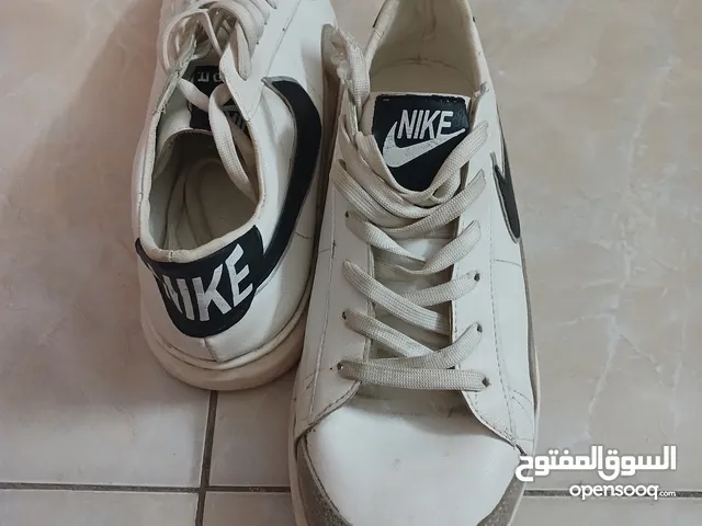 White sneakers/ كوتشي أبيض