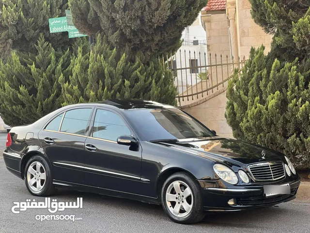 مرسيدس e200 موديل 2006 بحالة الوكالة فل اضافات افنتجارد لون اسود بالصلاة ع النبي ما شاء الله