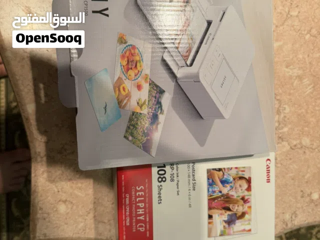 طابعة كانون سلفي مع 5 بوكسات اوراق