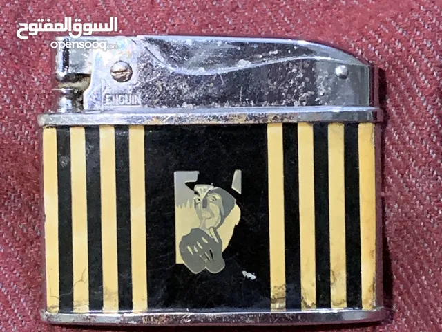 ولاعة Penguin نادرة بشعار Marcovitch Black & White – من الخمسينيات