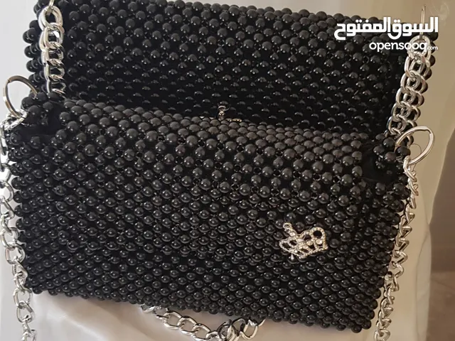 شنط خرز اسود حجم وسط وكبير