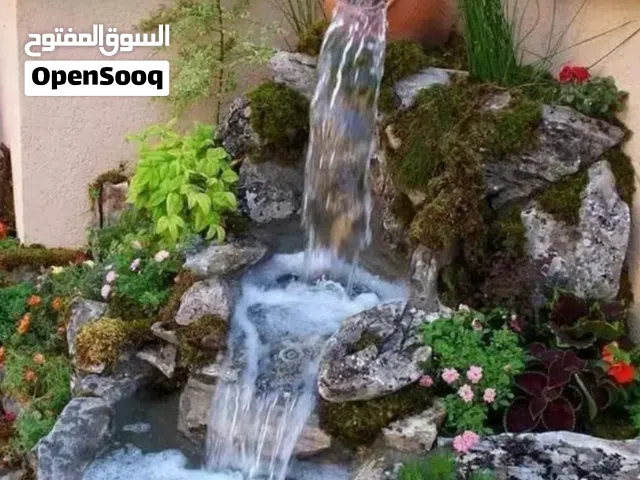 شلالات ونوافير نحت يدوي اسمنتيه وباضافات نباتاتيه طبيعيه وصناعيه