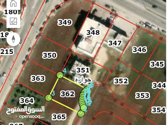 قطعة أرض للبيع تبعد عن إشارة البتراء 200 متر
