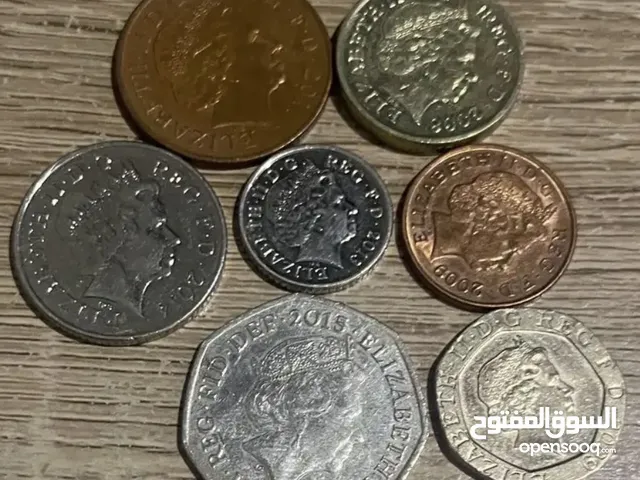 طقم عملات الملكة اليزابيث الثانية ( يشمل الدرع الملكي من الجهة الخلفية