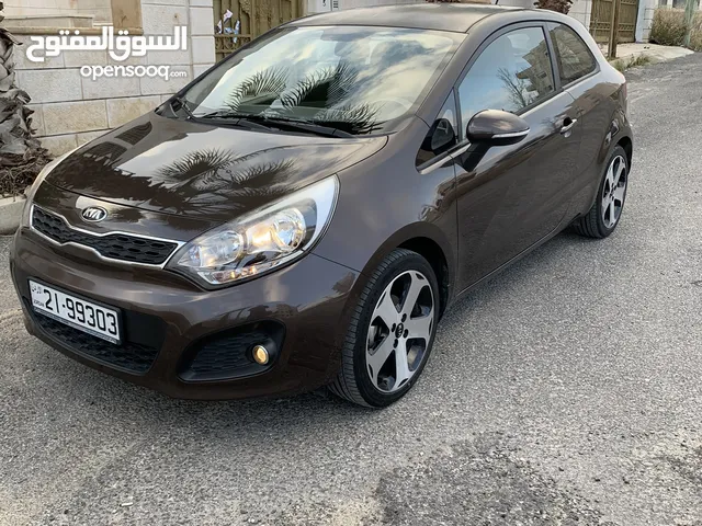 KIA RIO 2015 hatchback كيا ريو 2015 هاتشباك  بحالة الوكالة - وارد الوكالة الشركة الوطنية - مالك اول-