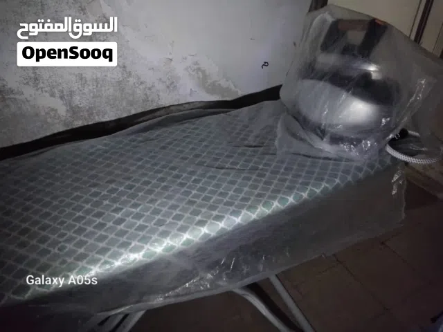 مكوه بخار مع طاولة كوي للبيع