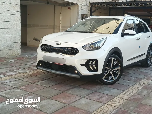 نيرو هايبرد جمرك جديد2021 ممشى 32الف وارد كوريا فحص كامل تدفئه كراسي جنطات تورنج