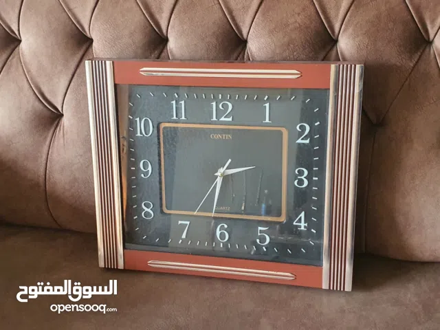 ساعه جداريه للبيع