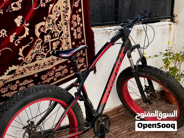 بسكليت HONGX جبلي 26 عجل عريض + غيارات / شبه جديد استعمال خفيف جدًا للبيع بسعر مغري �