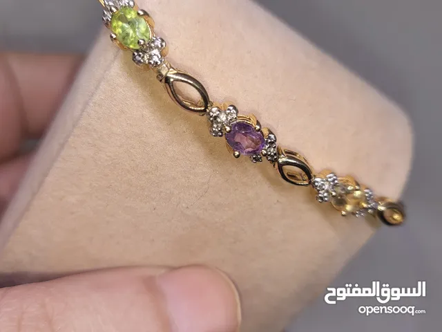 اسوارة فضه عيار 925 مطلي ذهب مع احجار الطبيعيه سترين واكوامارين وجارنت واماتيست