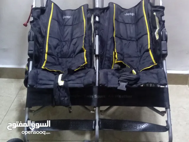 عرباية اطفال توأم للبيع في حاله جيده جدا