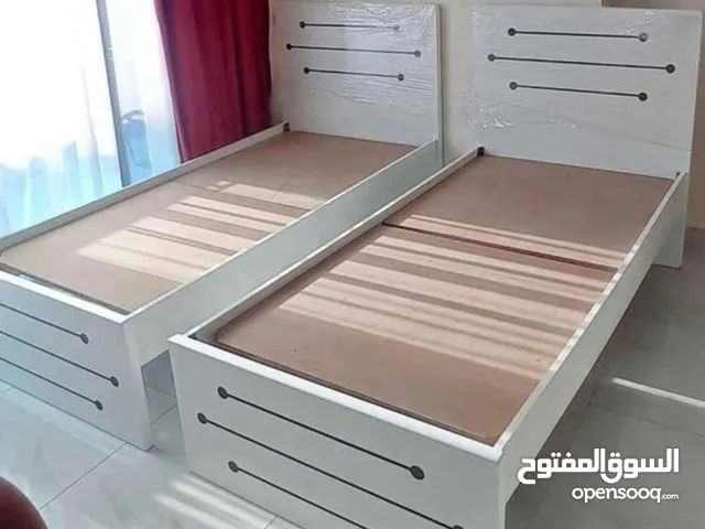 Selling brand new single bed with mattress