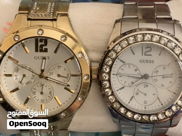ساعتين Guess أصليات ستايل فاخر – ذهبي وفضي بحالة ممتازة