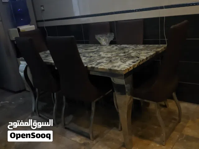 ميز مرمر رجلين ستيل + 6 كراسي