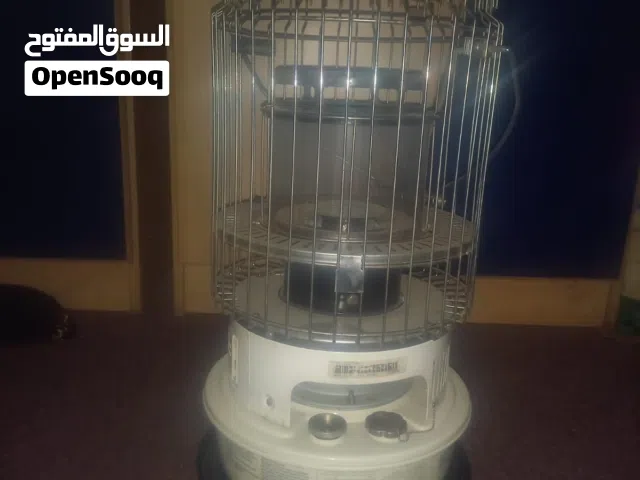 للبيع مدفأة كيروسين عملية ومناسبة لأيام البرد تعمل بكفاءة