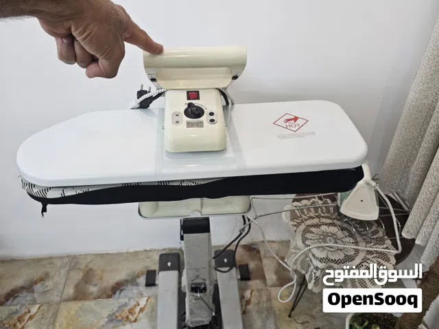 مكواة كبس بخاري